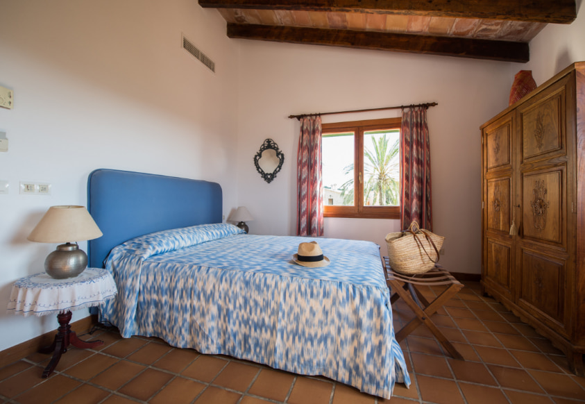 Bed and furniture in the double room