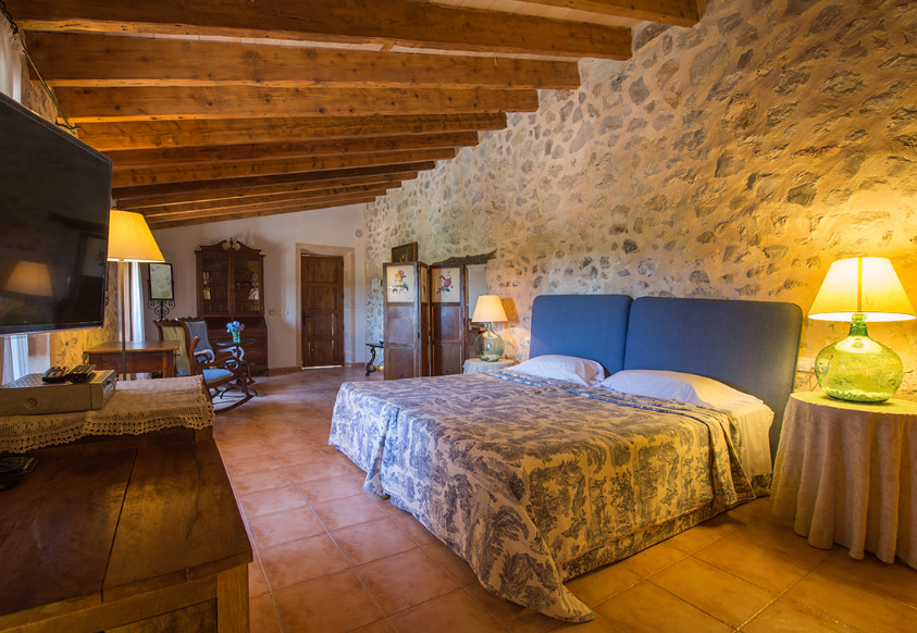 Beds in the Junior Suite at Can Feliu